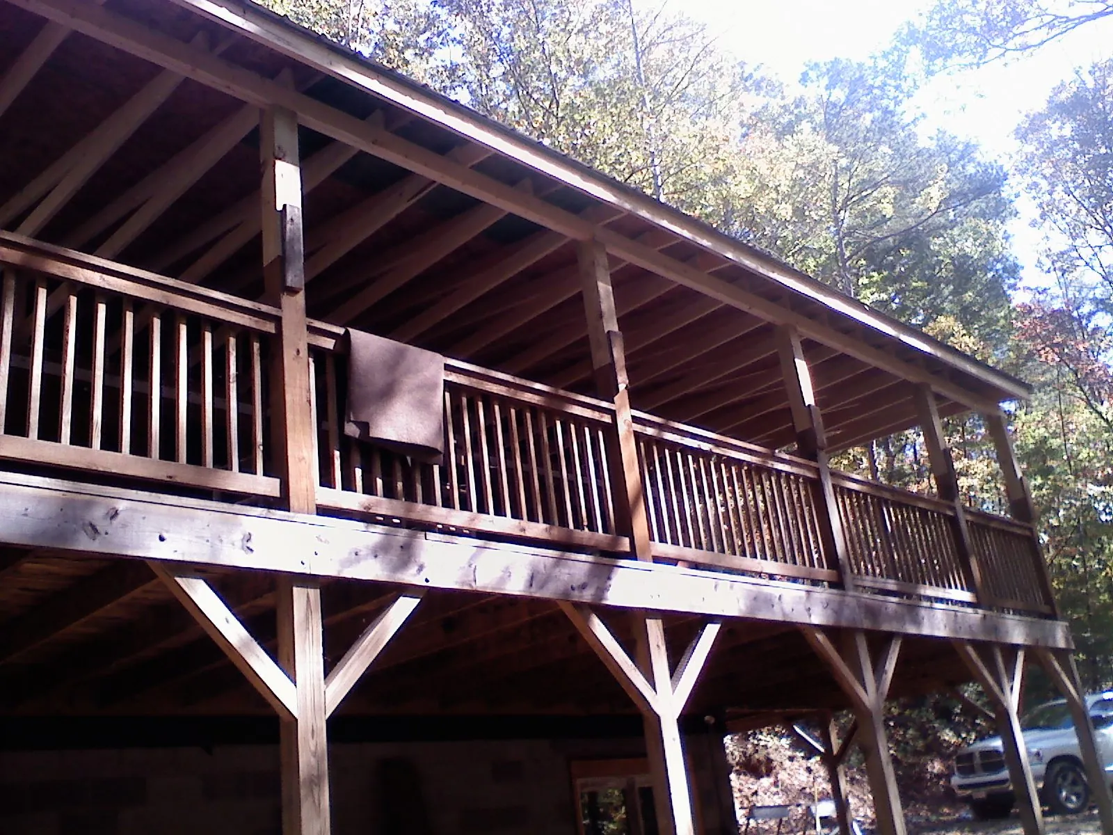 Timber framing under a new elevated porch and deck — Roof Leak Repair in Paul Smiths by Roofing Brothers